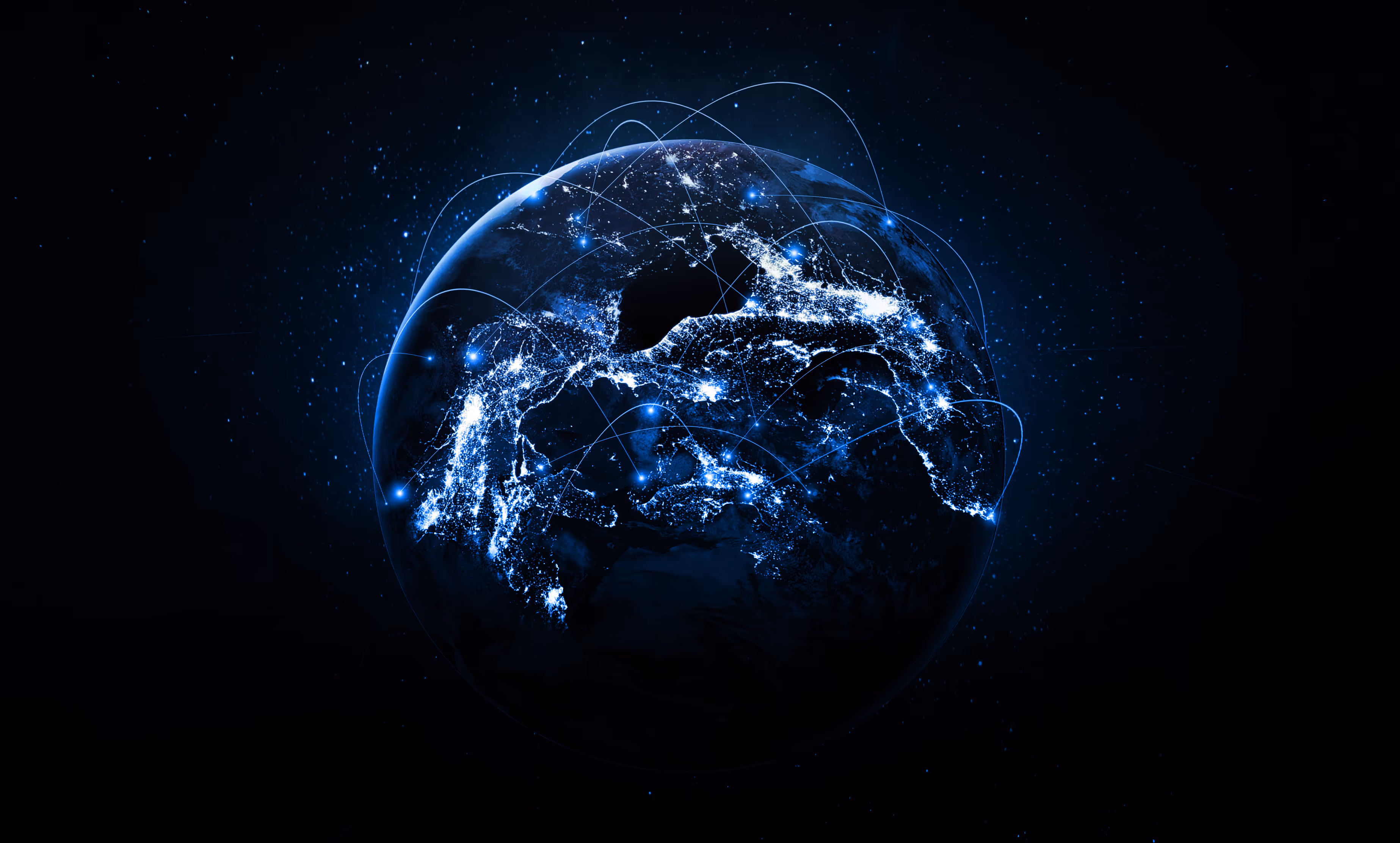 Digital globe showing illuminated network connections across continents in blue tones.