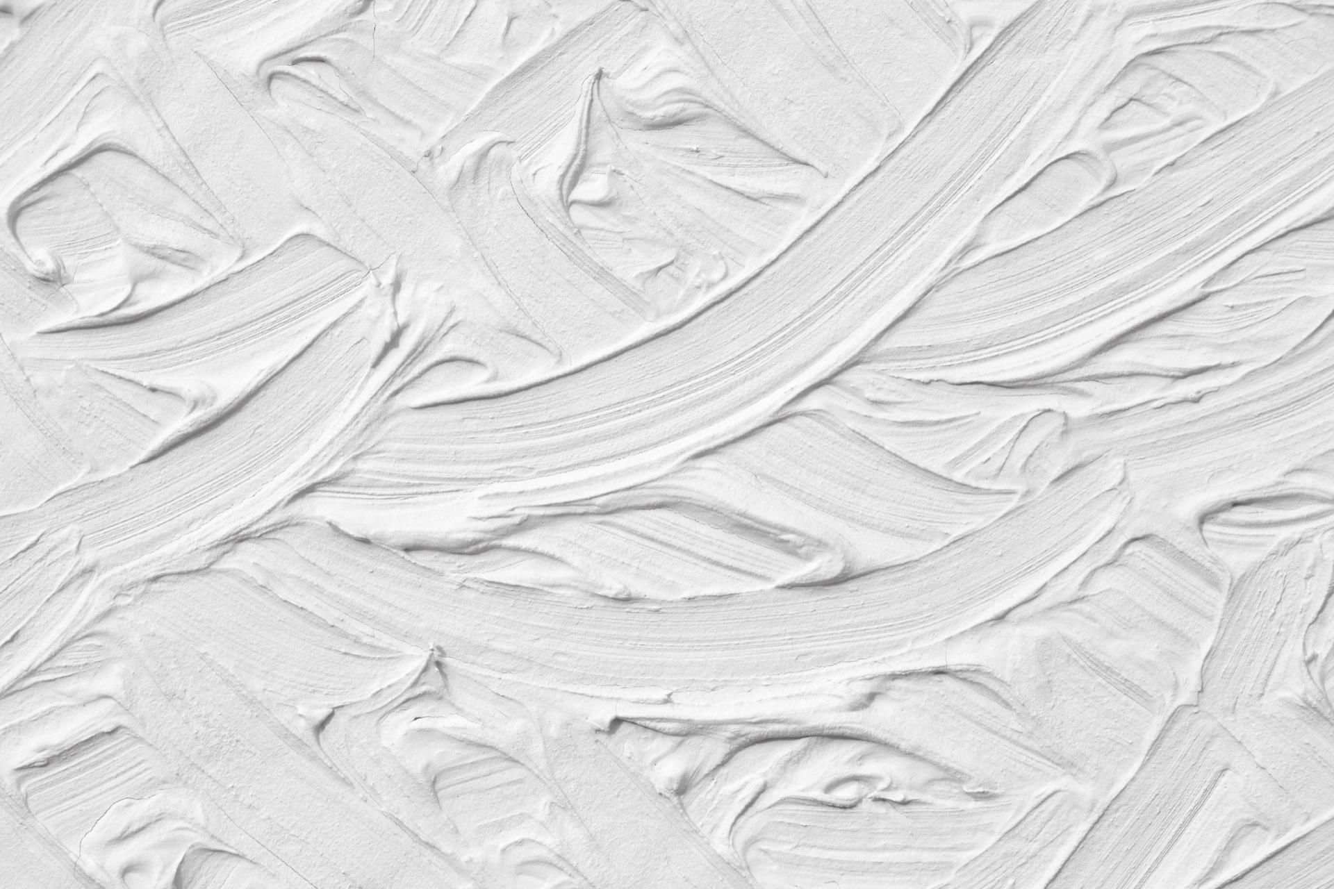 Close-up of textured white paint strokes