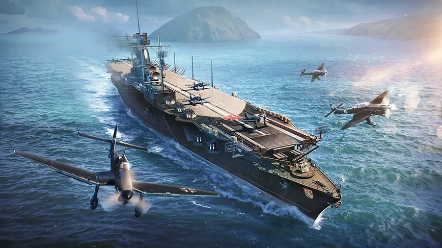 A large aircraft carrier ship sailing in the ocean accompanied by four airplanes flying nearby with mountains visible in the background.