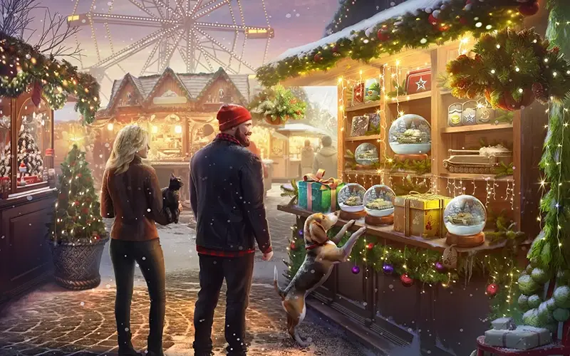 Couple and dog browsing a festive outdoor market stall decorated with Christmas lights, wreaths, snow globes, and gift boxes during a snowy evening.