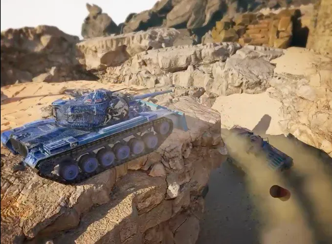 Blue tank positioned on rocky terrain overlooking a dusty battlefield with another tank partially visible below.