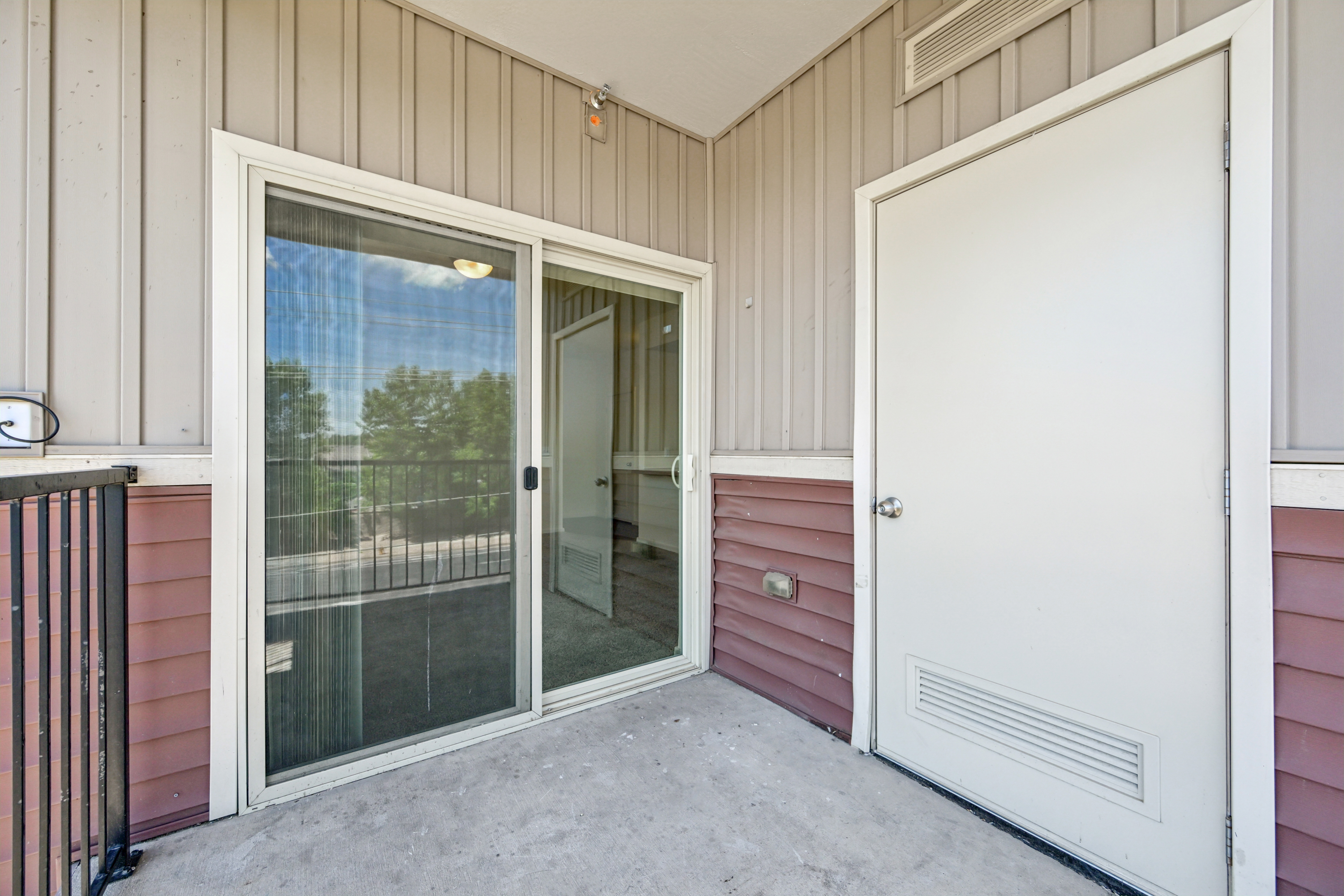 Covered private patio with storage outdoor and outdoor living space