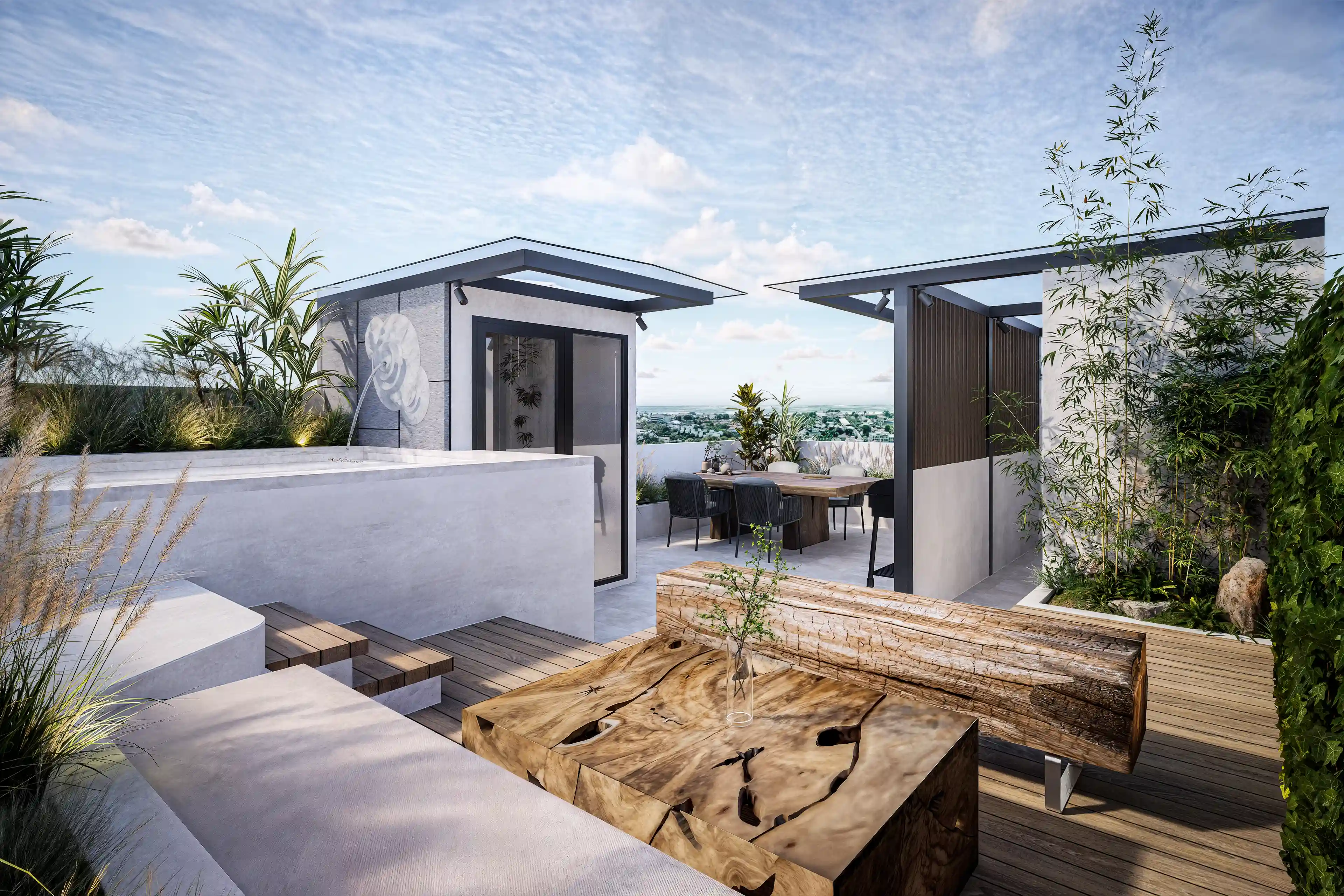 Rooftop villa terrace with outdoor dining area and surrounding greenery overlooking Bali’s landscape.