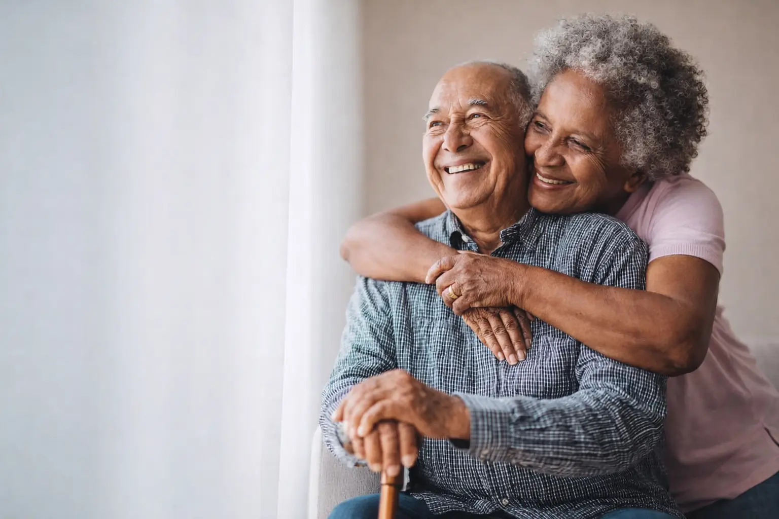 elderly couple embracing