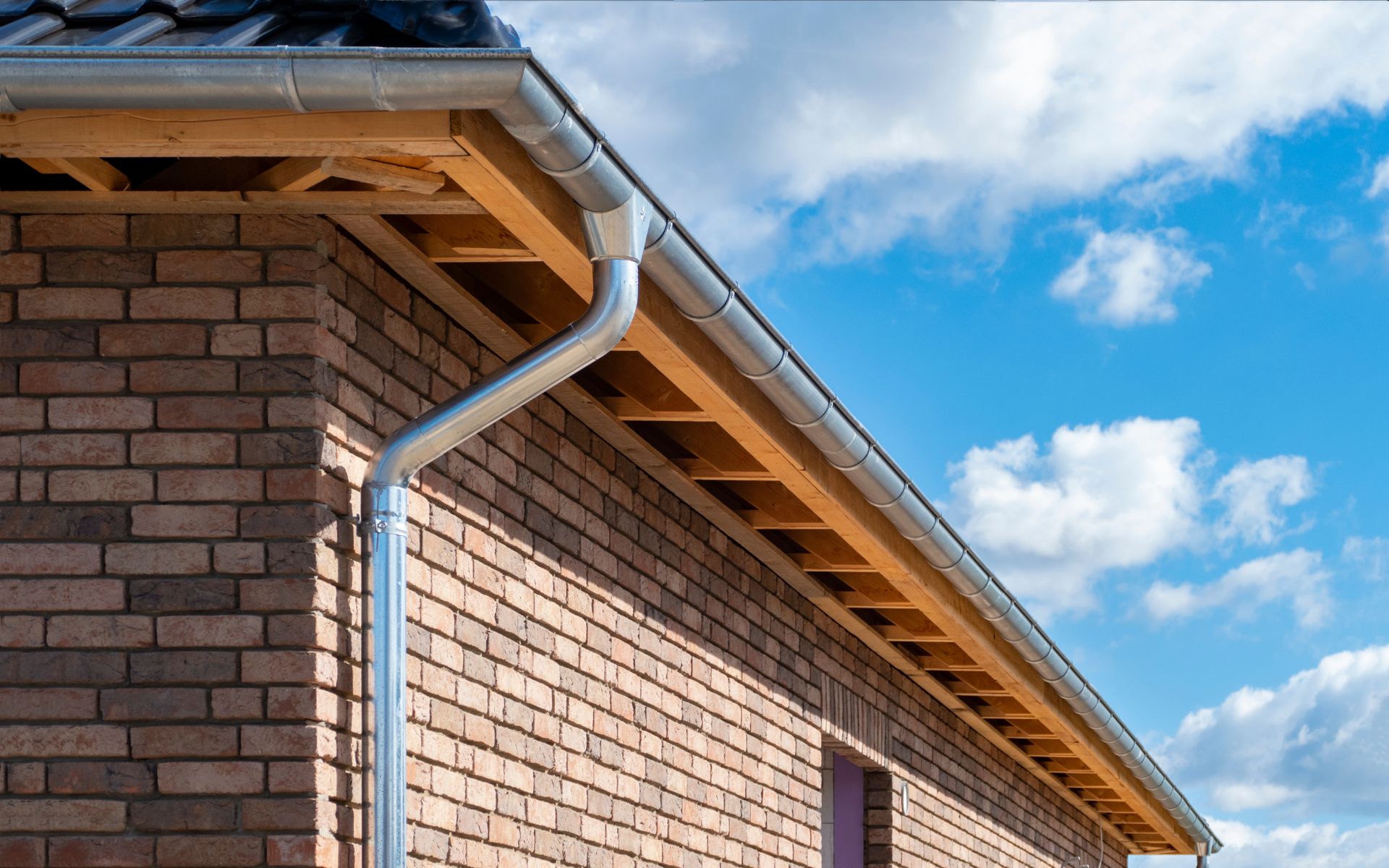 Gutter with downspout