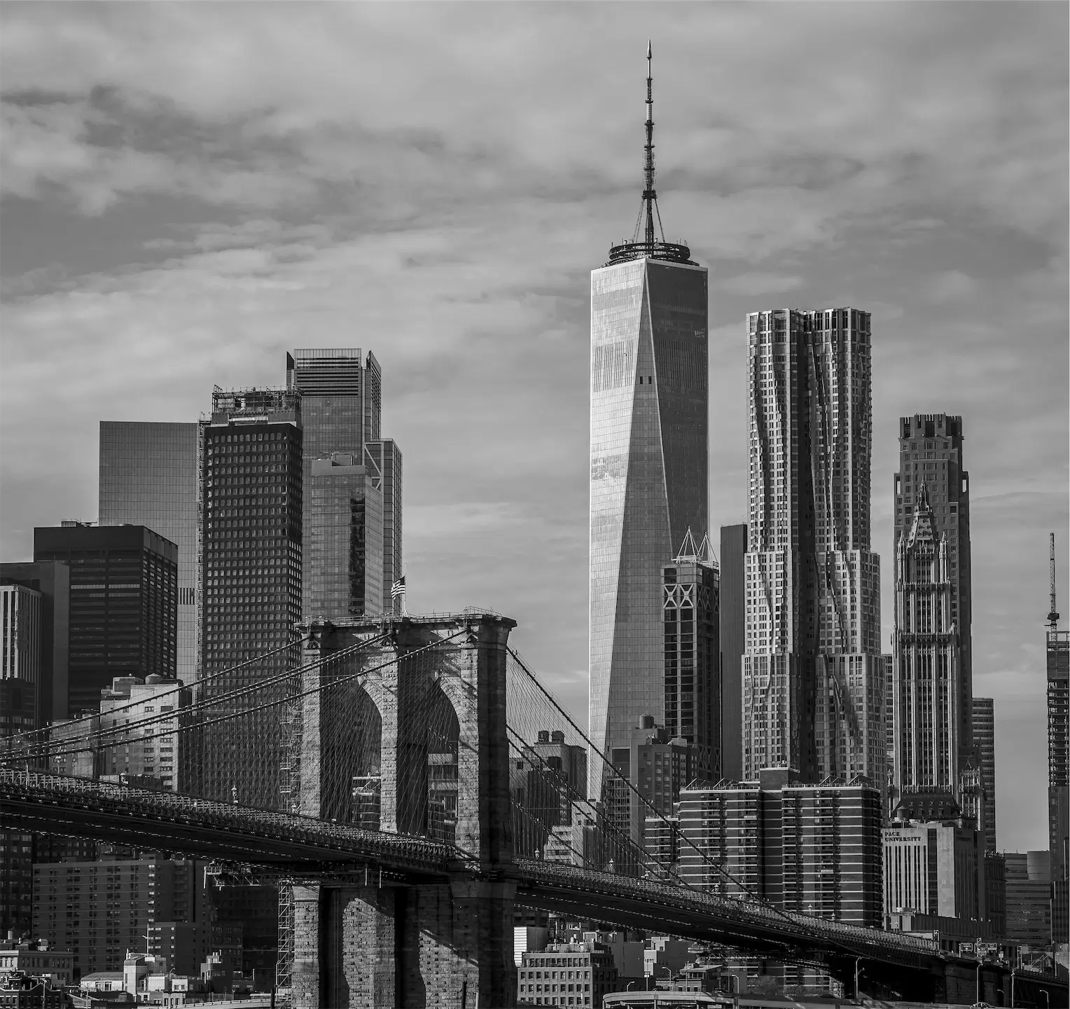 A black and white photo of a city skyline.