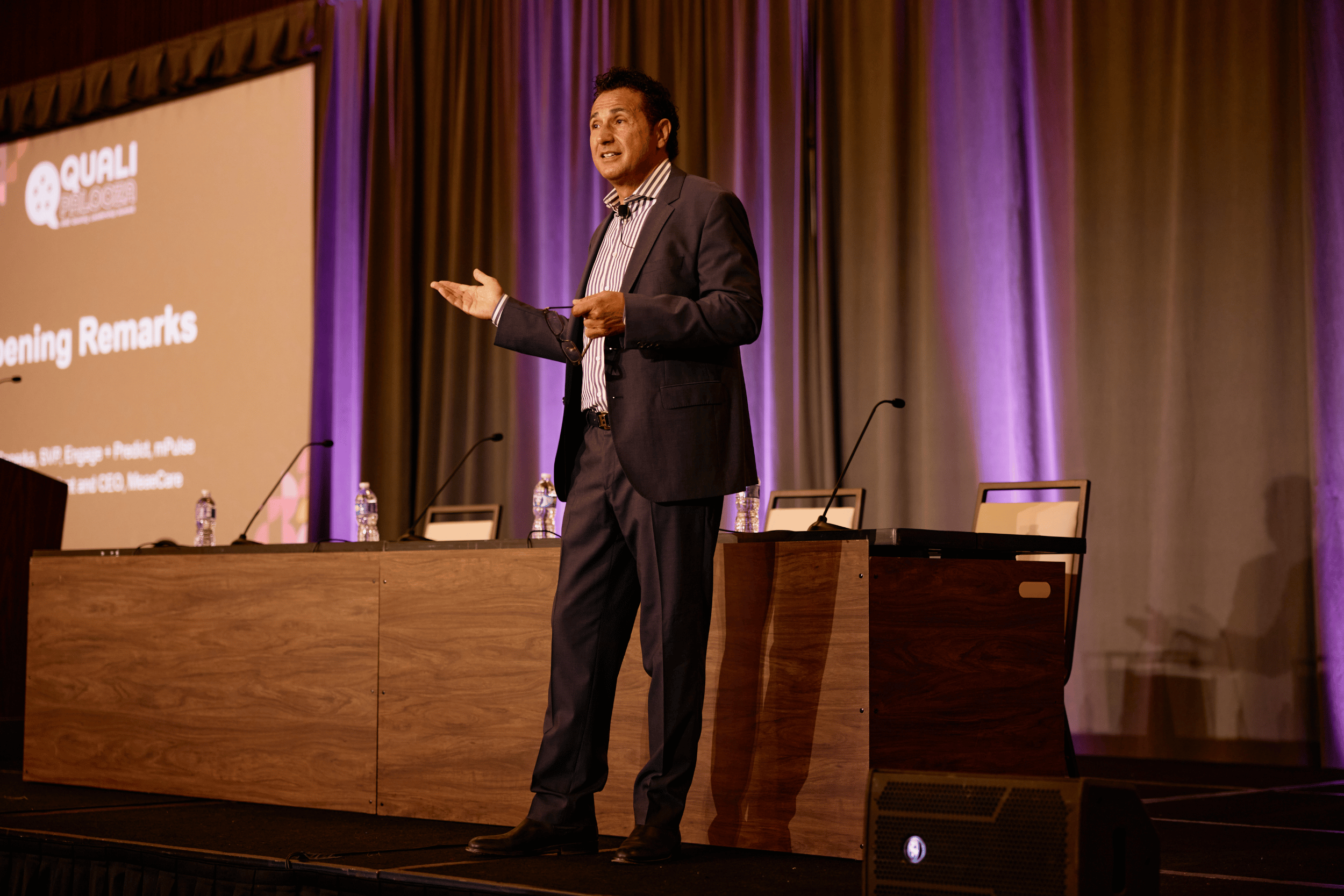 Sy Zahedi, Founder and CEO of MeaeCare, delivering opening remarks on stage at Qualipalooza 2026 in Frisco, Texas