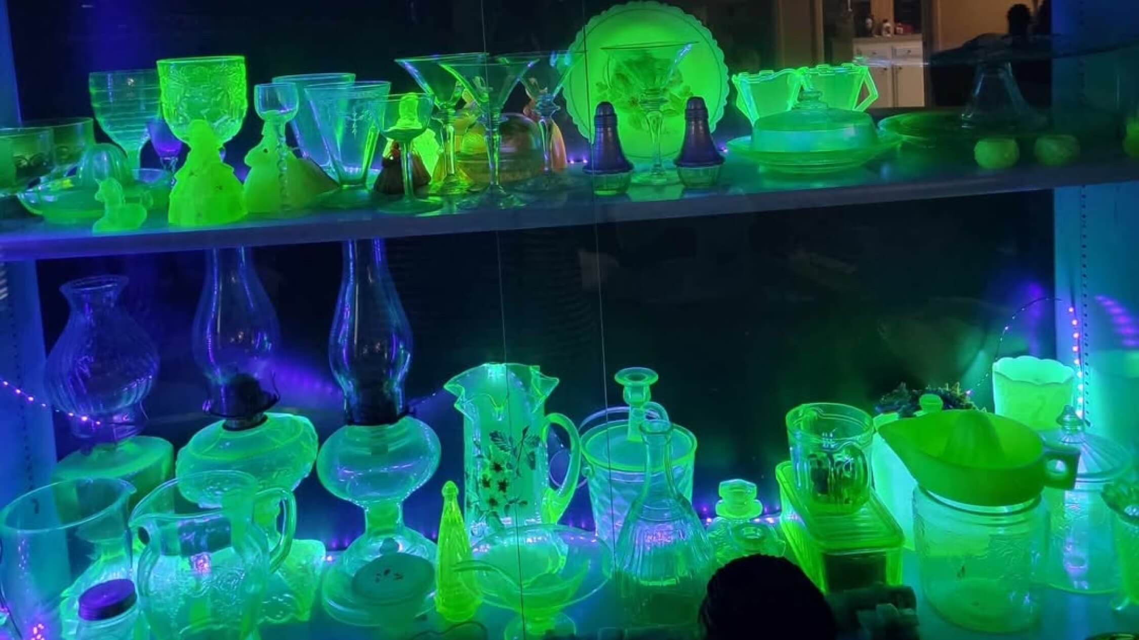 Uranium glass glowing a neon green under a blacklight.
