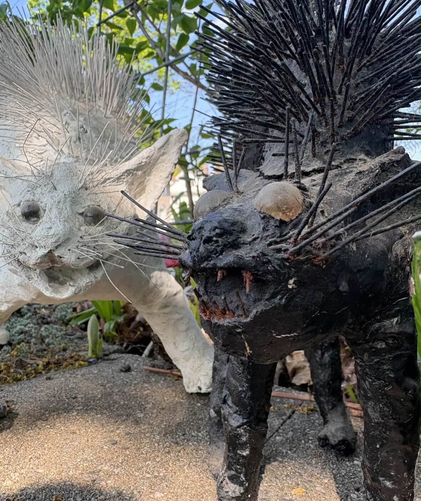 Two taxidermy statues outside.