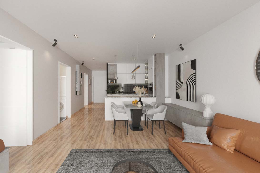 Offener Wohn- und Essbereich mit moderner Einbauküche und Ledersofa