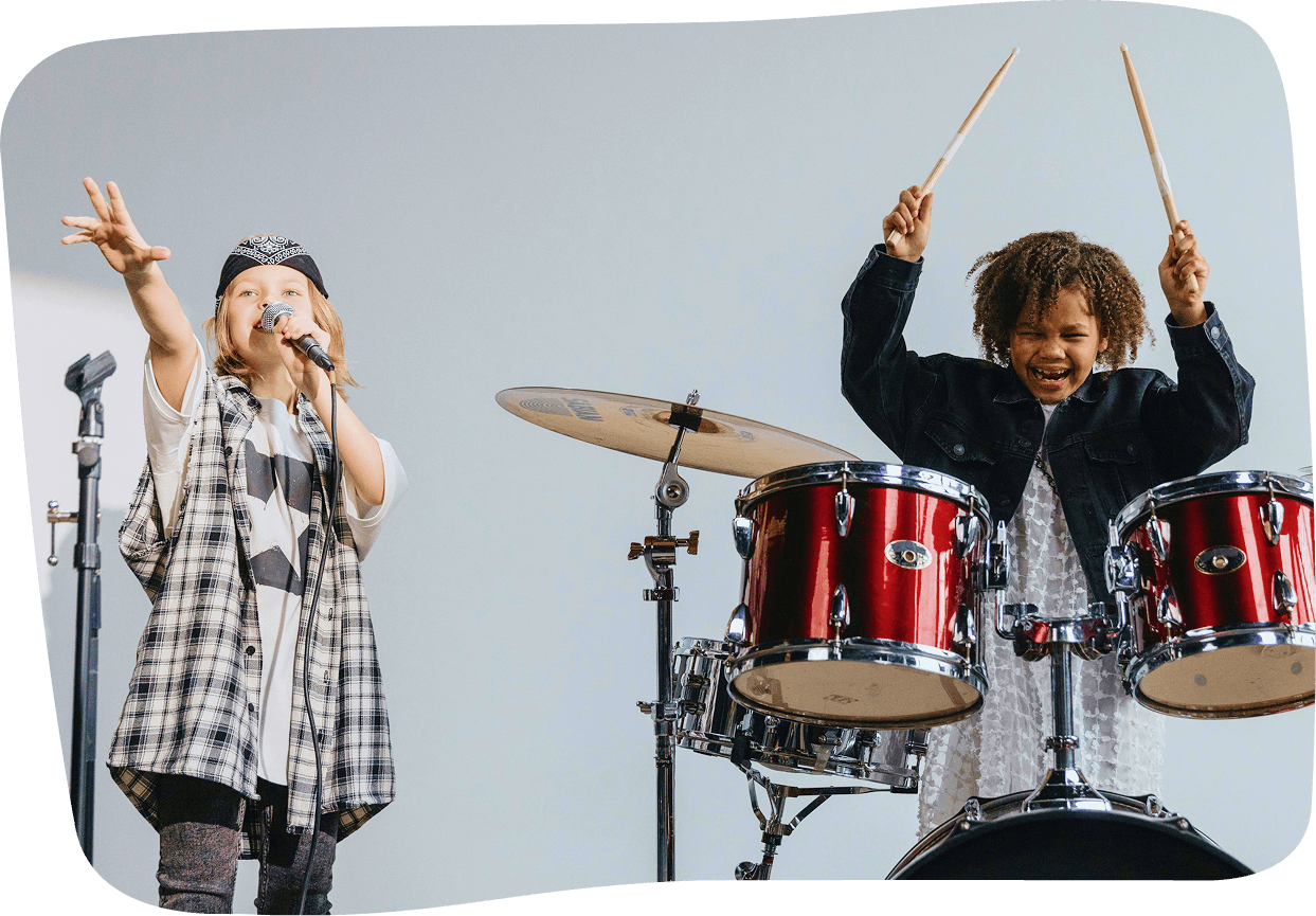 Children singing and playing instruments, supported by Elody’s educational environment and ongoing music learning updates.