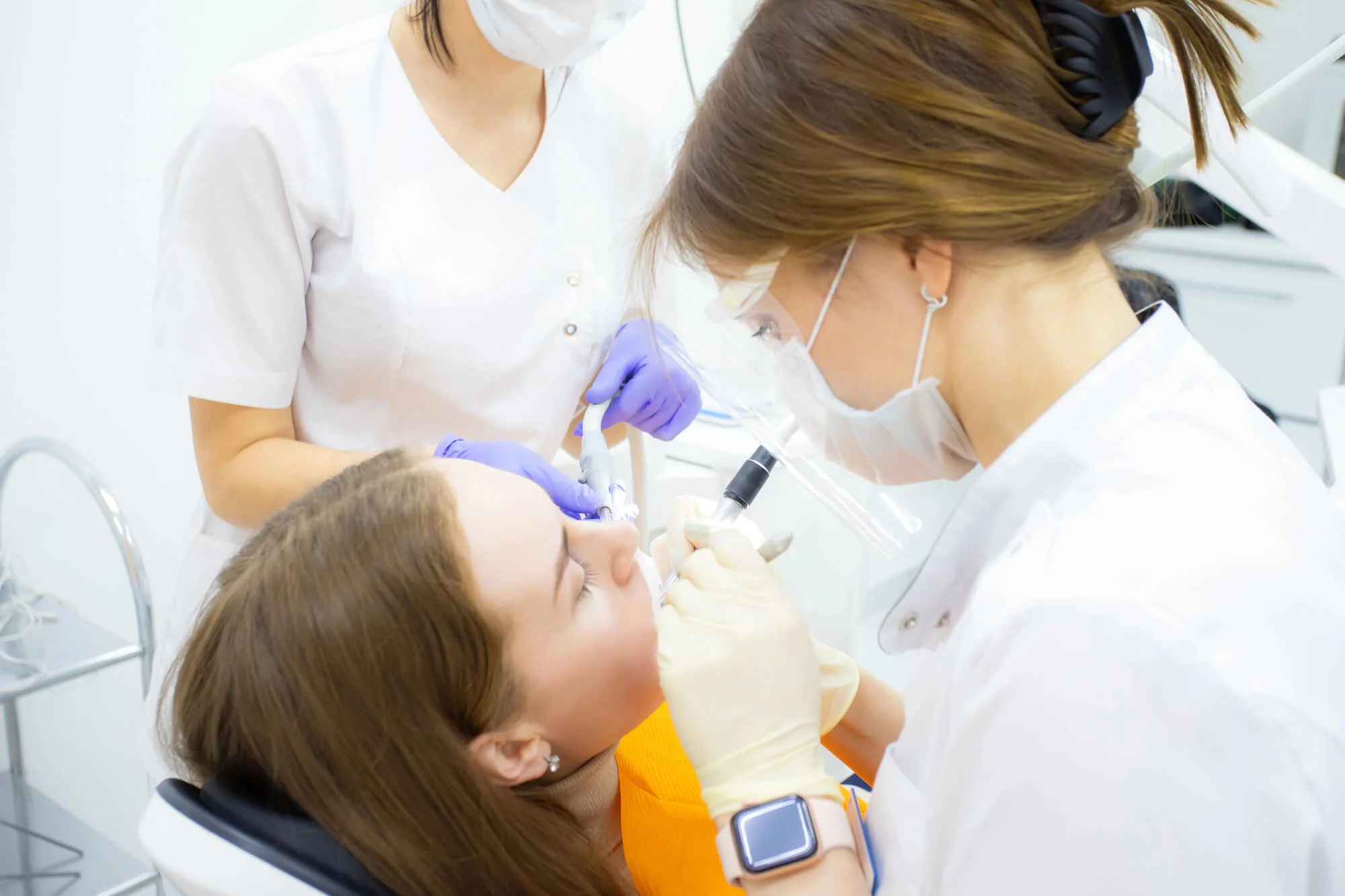 Dentist performing tooth extractions in Havertown.
