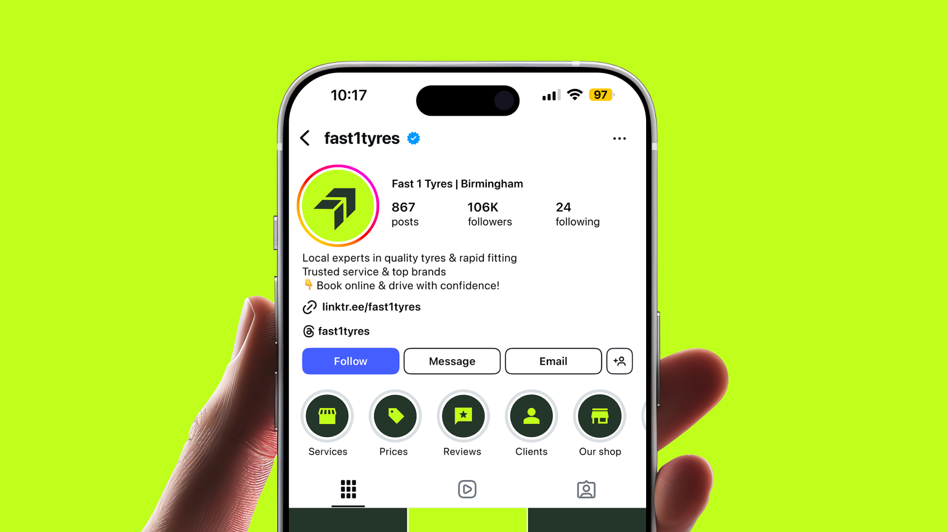 Hand holding a smartphone displaying the Instagram profile of fast1tyres with 106K followers and options to follow, message, or email.
