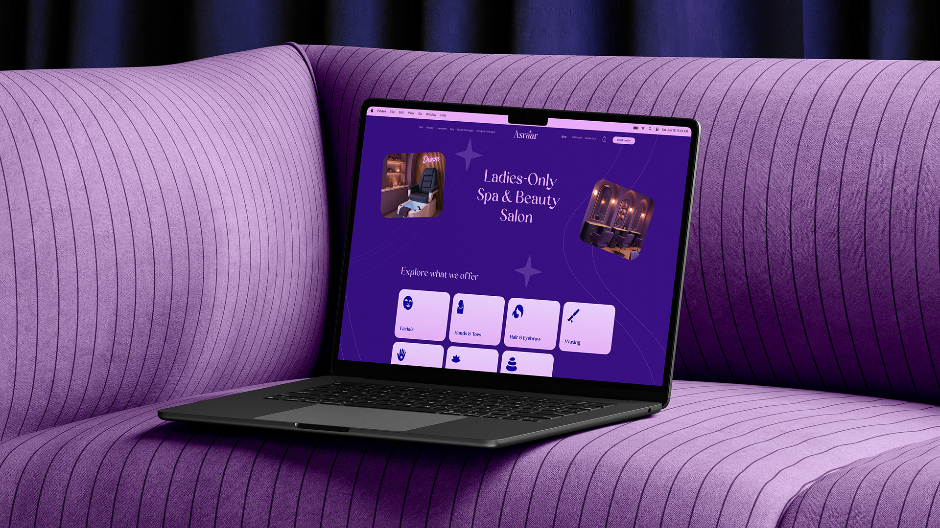 Open laptop displaying a purple-themed ladies-only spa and beauty salon website on a purple striped couch.