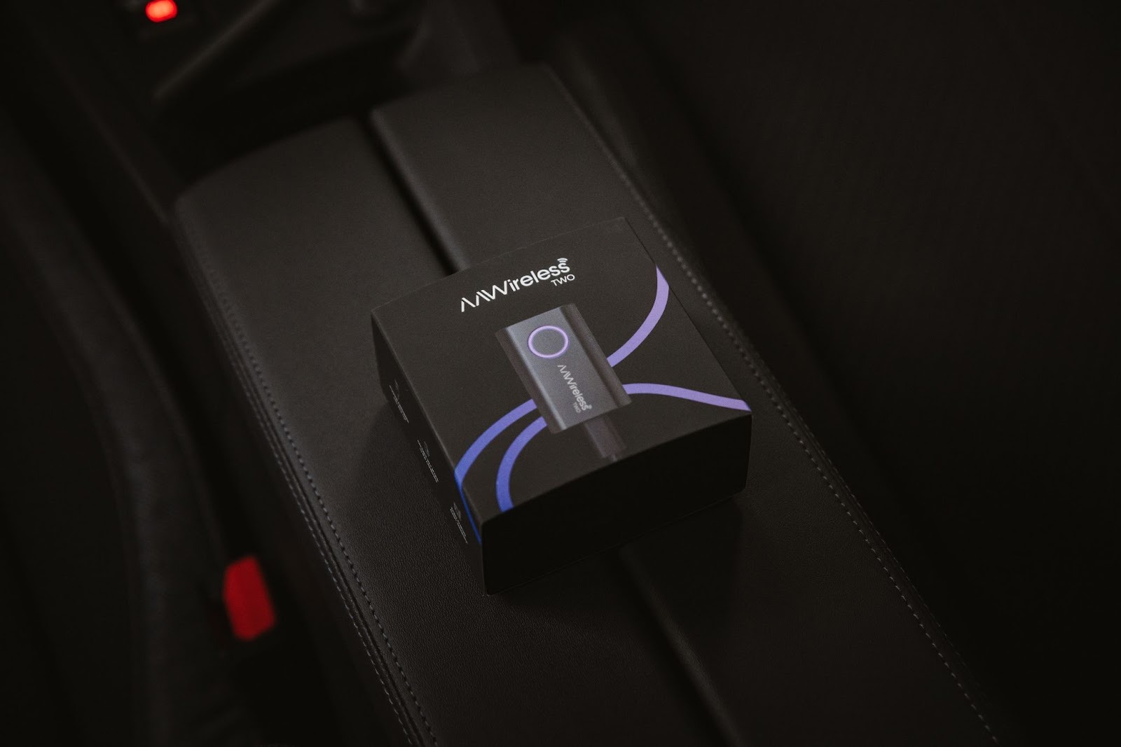 AAWireless Package with a picture of the device in the car interior