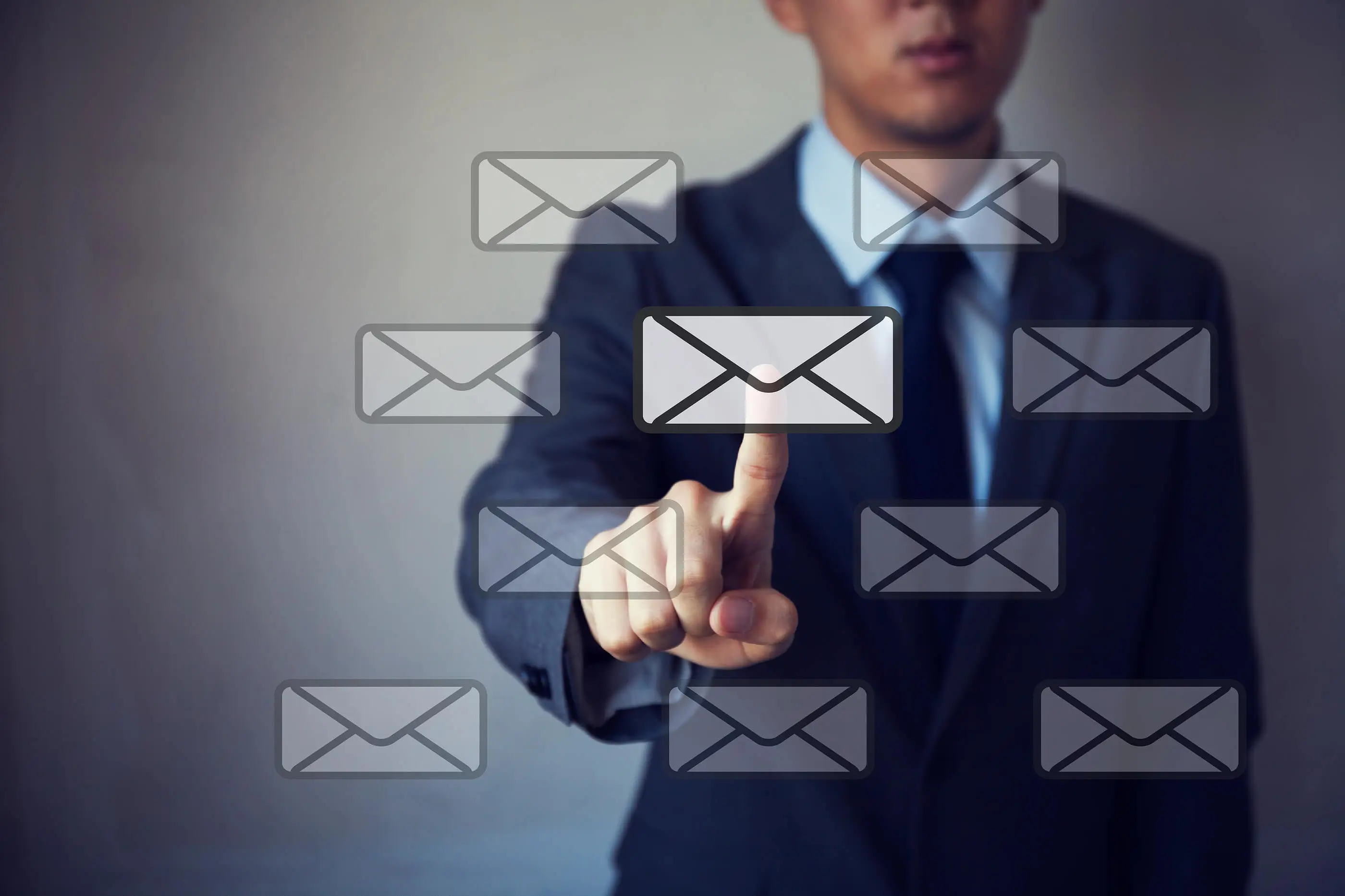 Businessman touching Virtual email icon