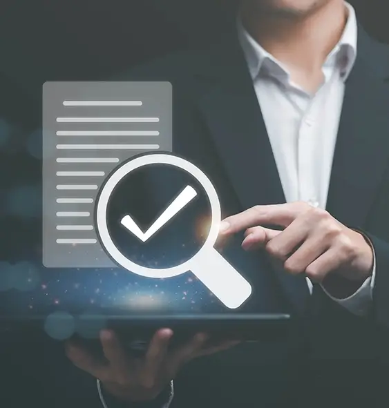 Businessman Holding And Magnify glass