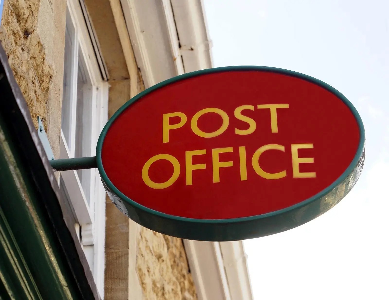 Close-up of Royal Mail post office signage