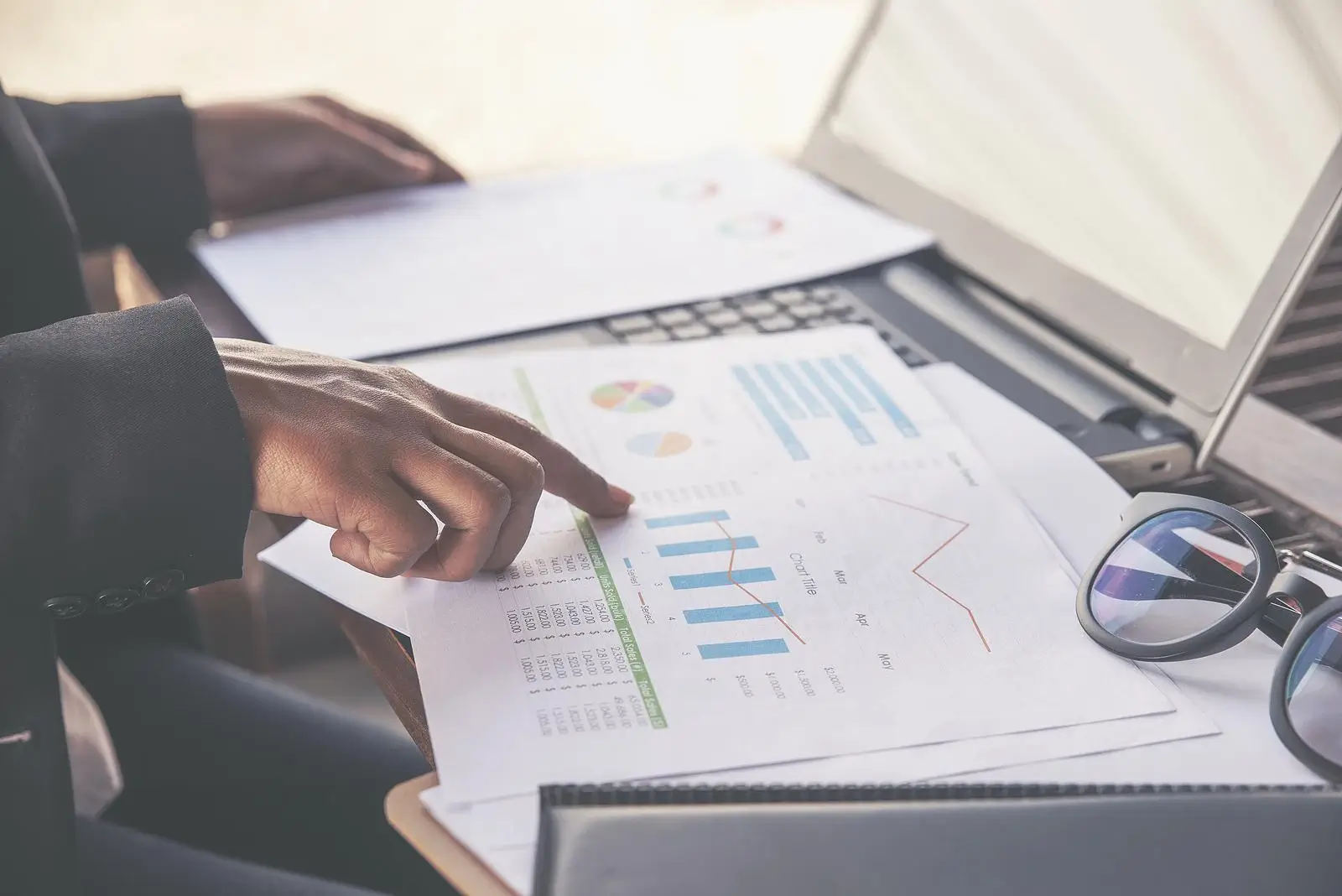 Close-up of someone reviewing financial data