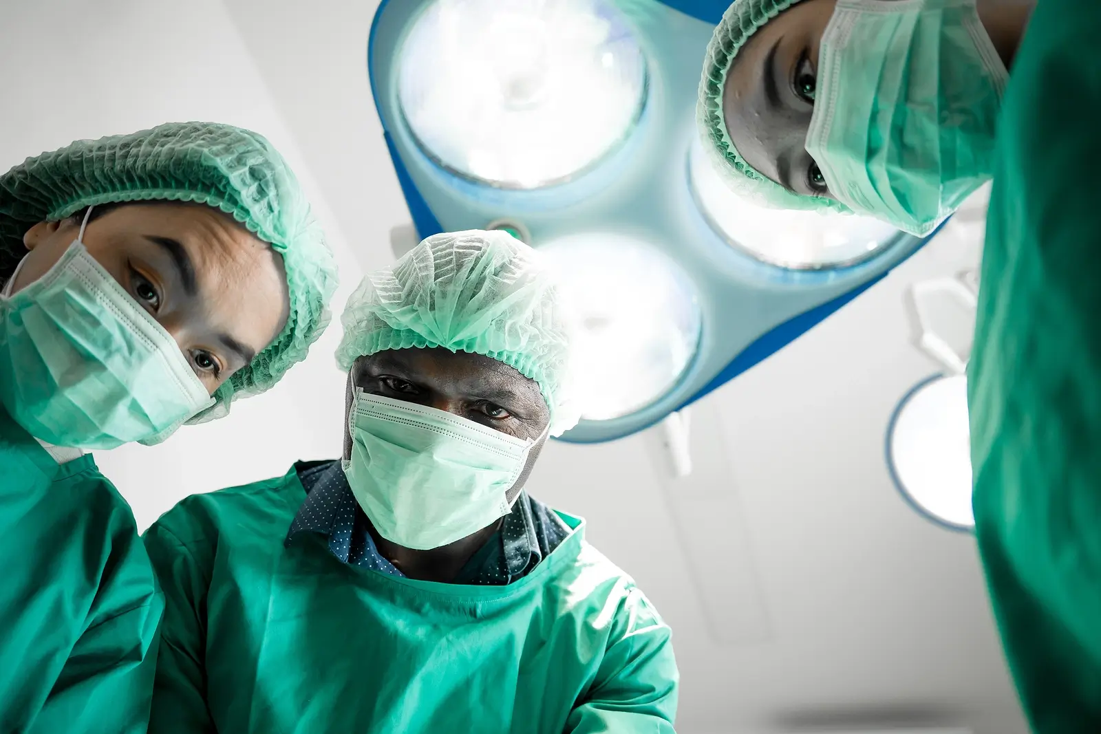 Team Surgeons With Medical Masks