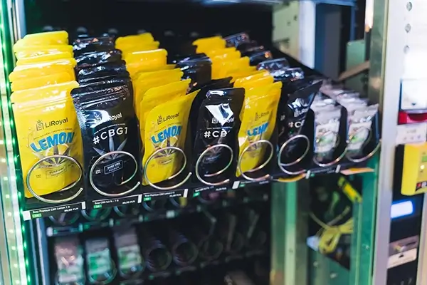 Close-up of package CBD products in a vending machine rack