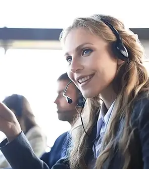 Smiling young women on a call with a headset