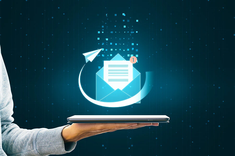 Female hand holding an email icon image