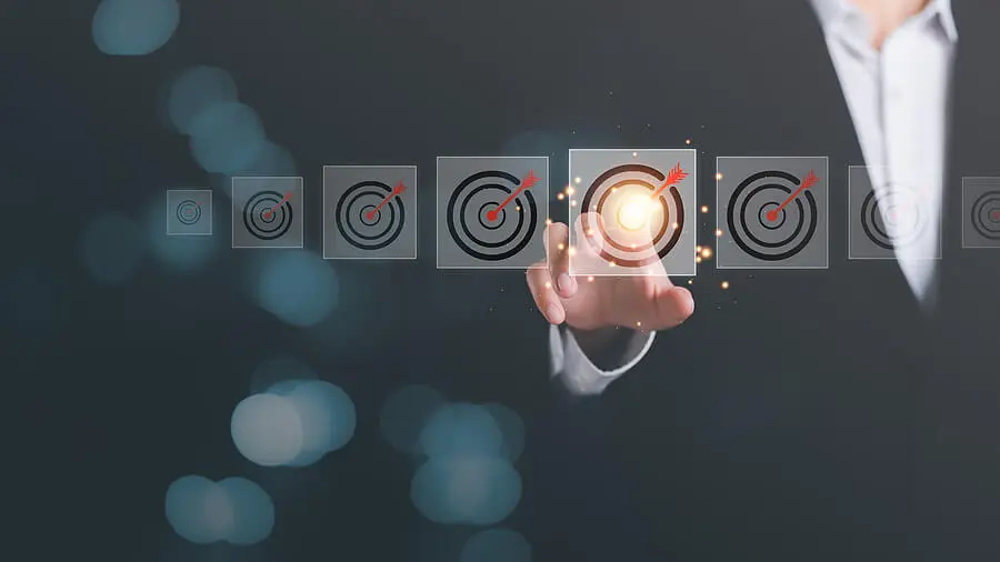 Businessman pointing to targets