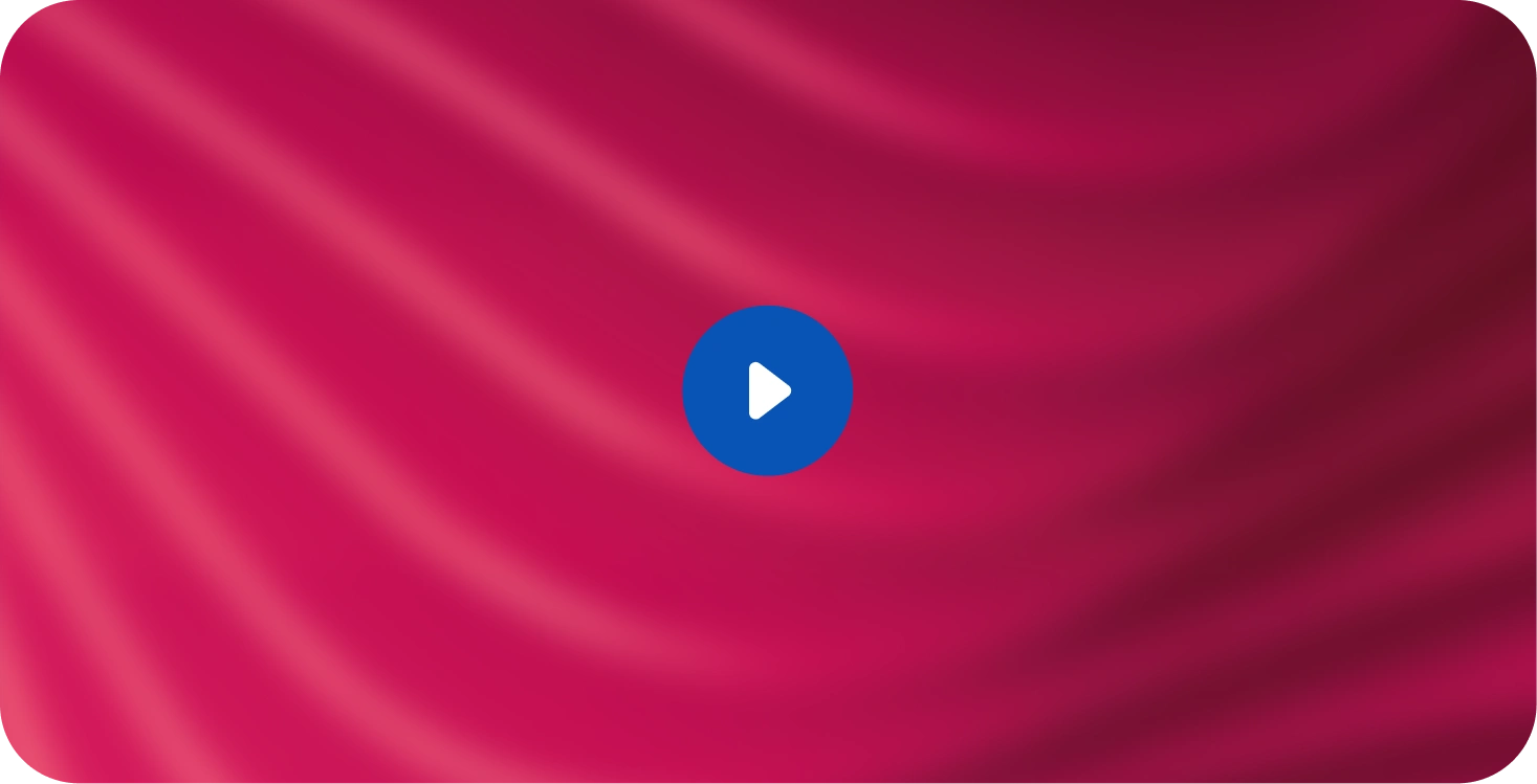 Play button on a red silky fabric background.