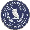 White embossed seal of the American Valuation Society featuring an owl surrounded by laurel branches and stars.
