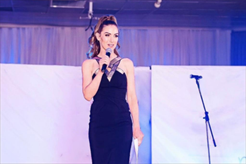 Sarah in a conference