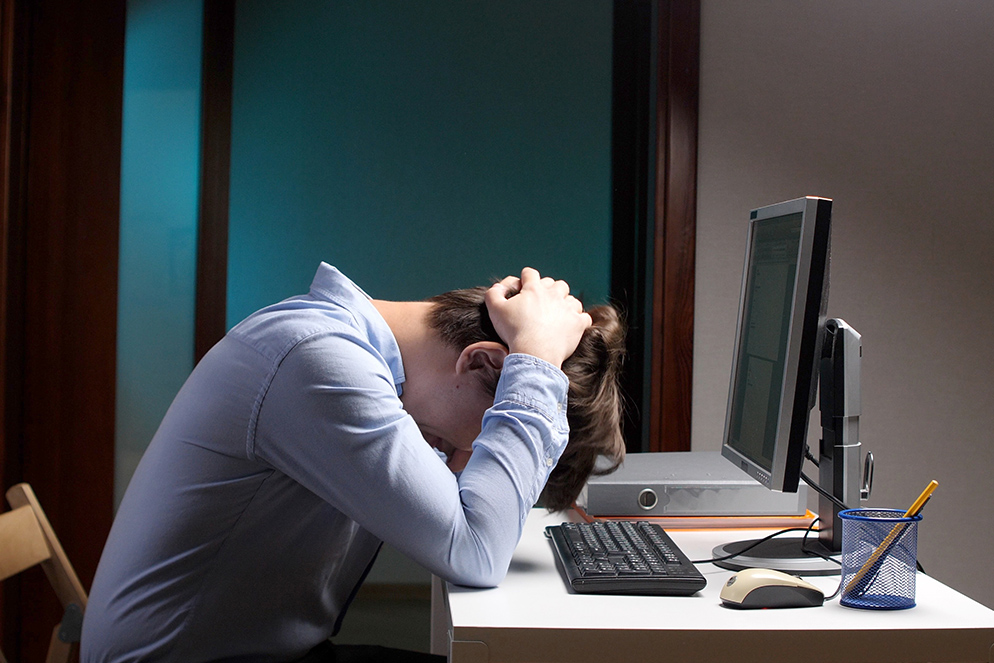 Staff at desks in an office