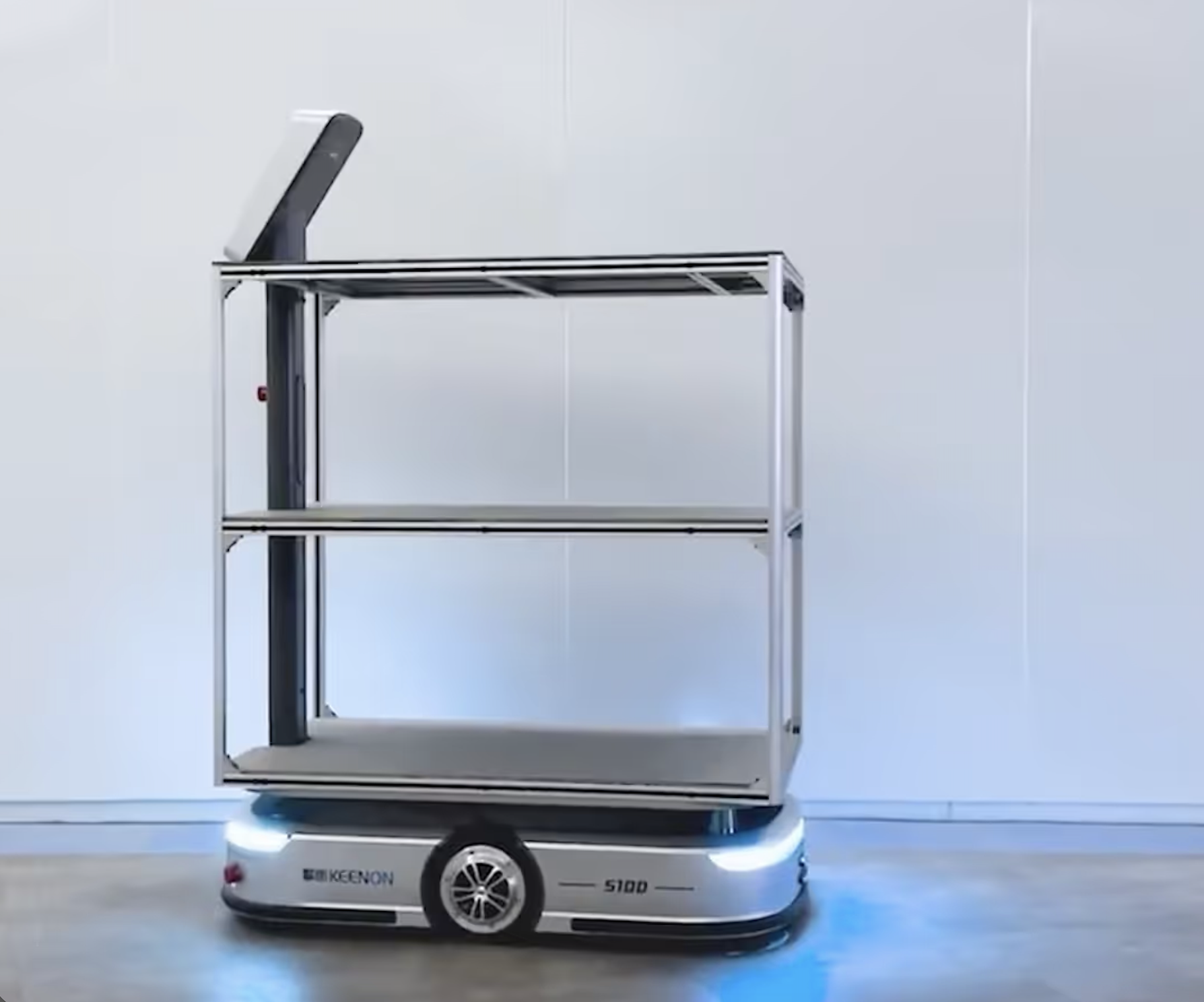 Autonomous mobile robot with a three-tier metal frame for carrying heavy loads indoors.