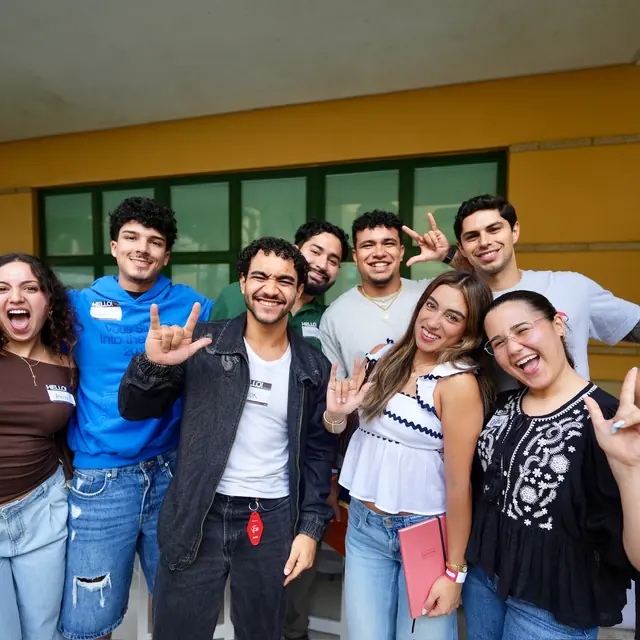 A group of young adults celebrating together at VOUS
