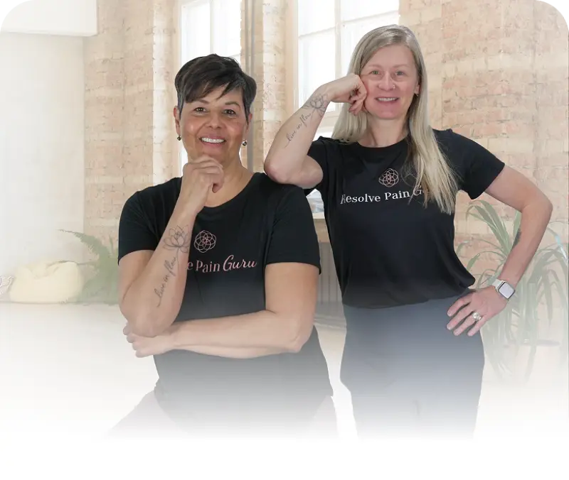 Carrie and Nicole smiling in Resolve Pain Guru shirts