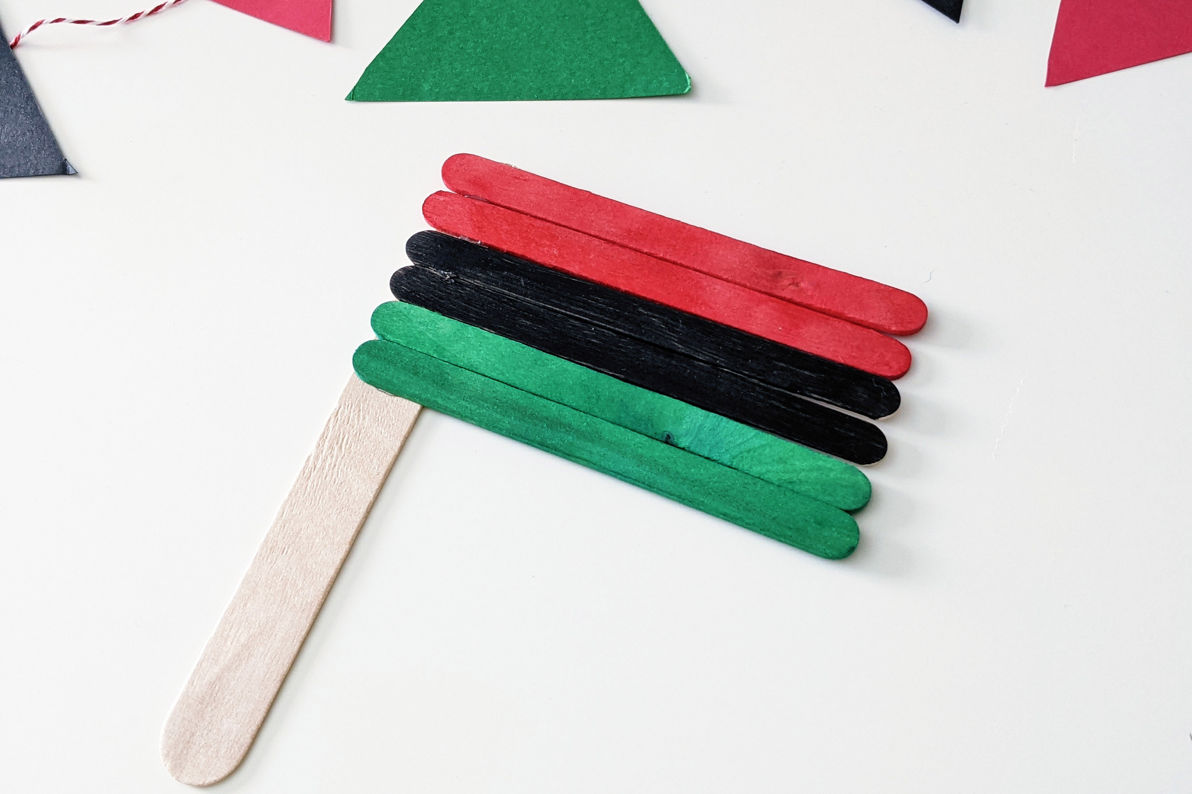 How to celebrate Juneteenth craft stick flag.