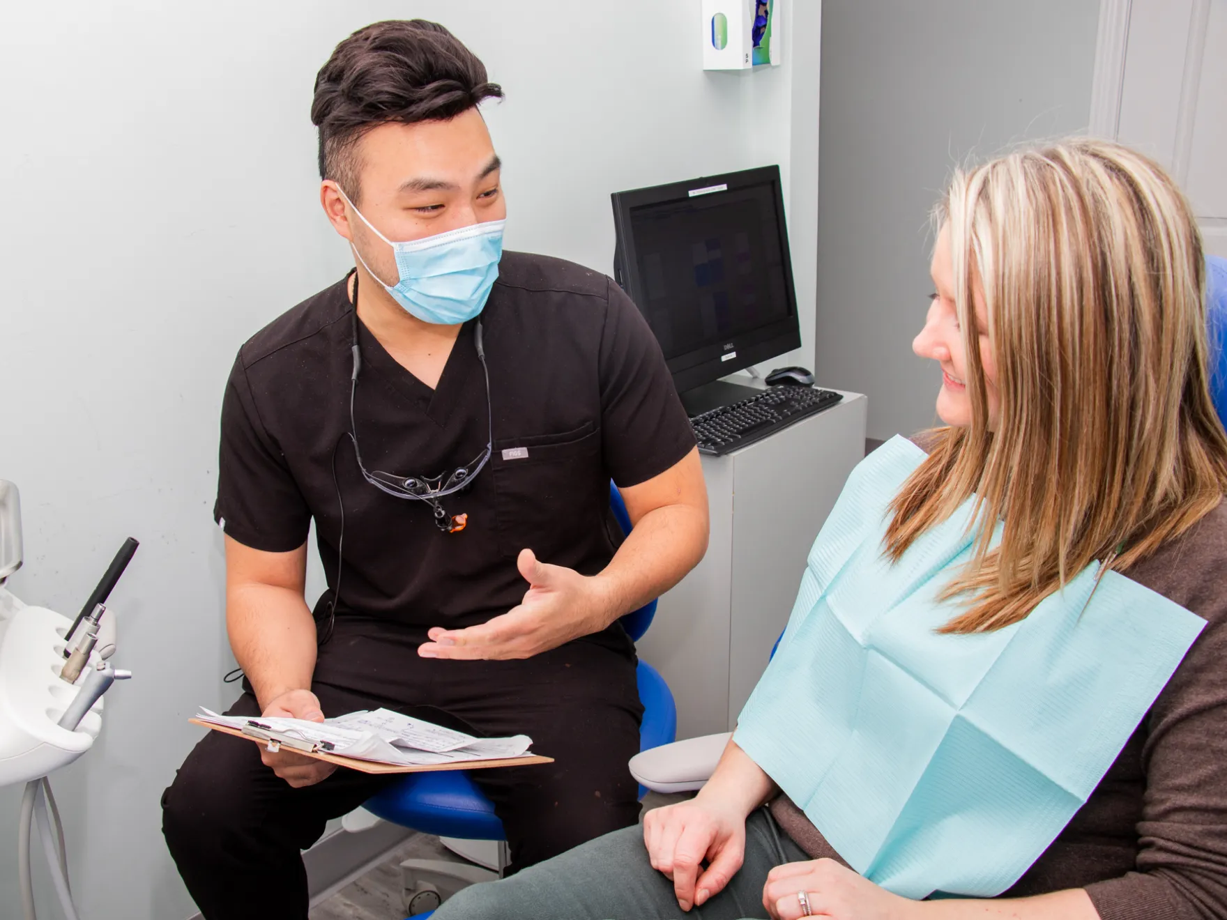 Dr. Siu talking to patient