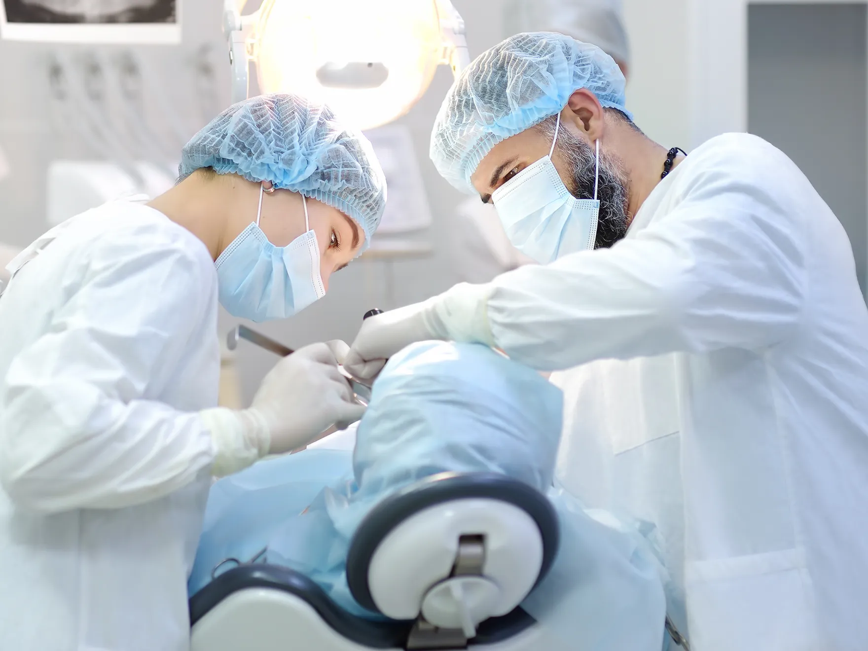 A couple of people that are in a room.