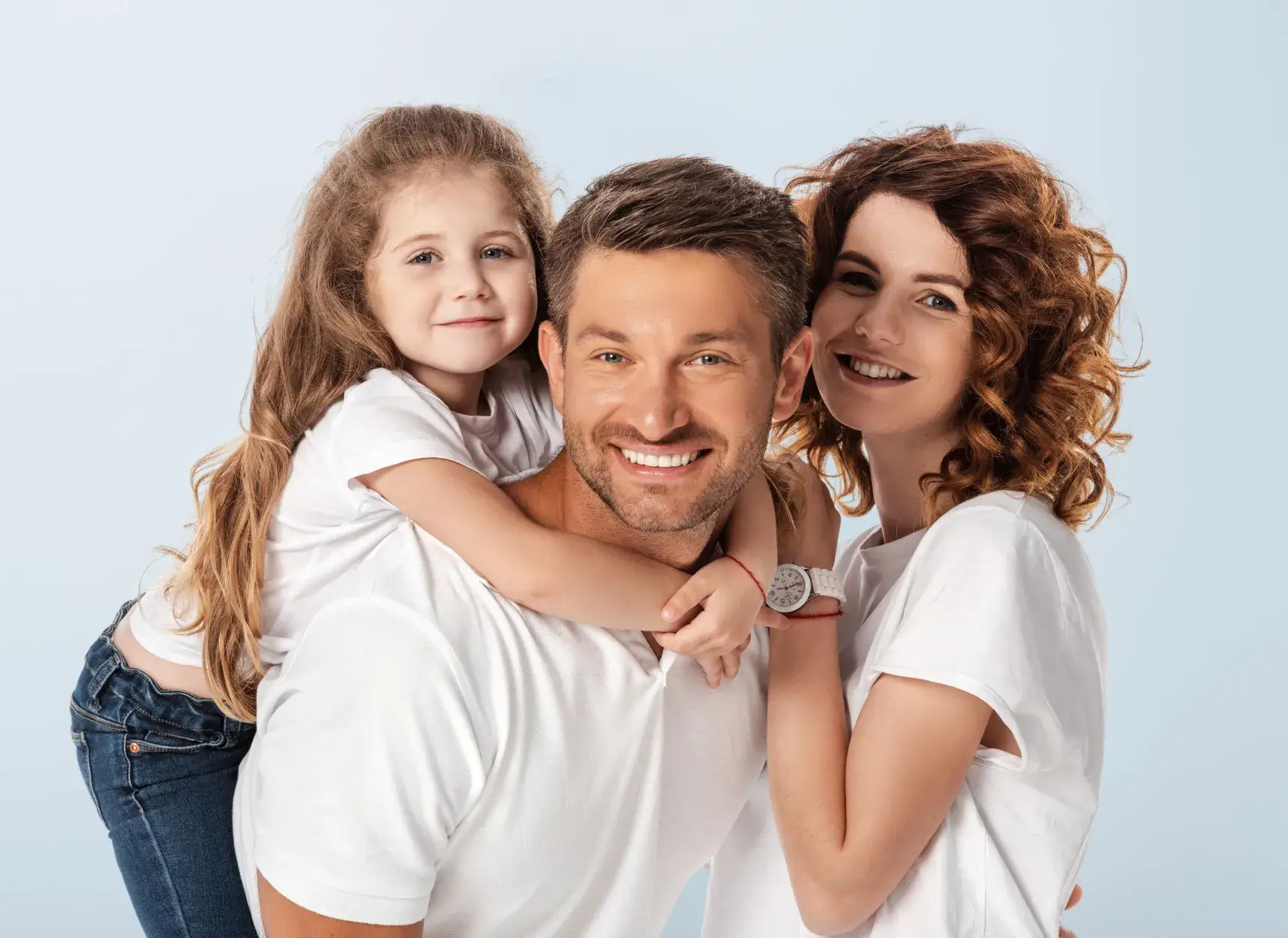Family of three smiling