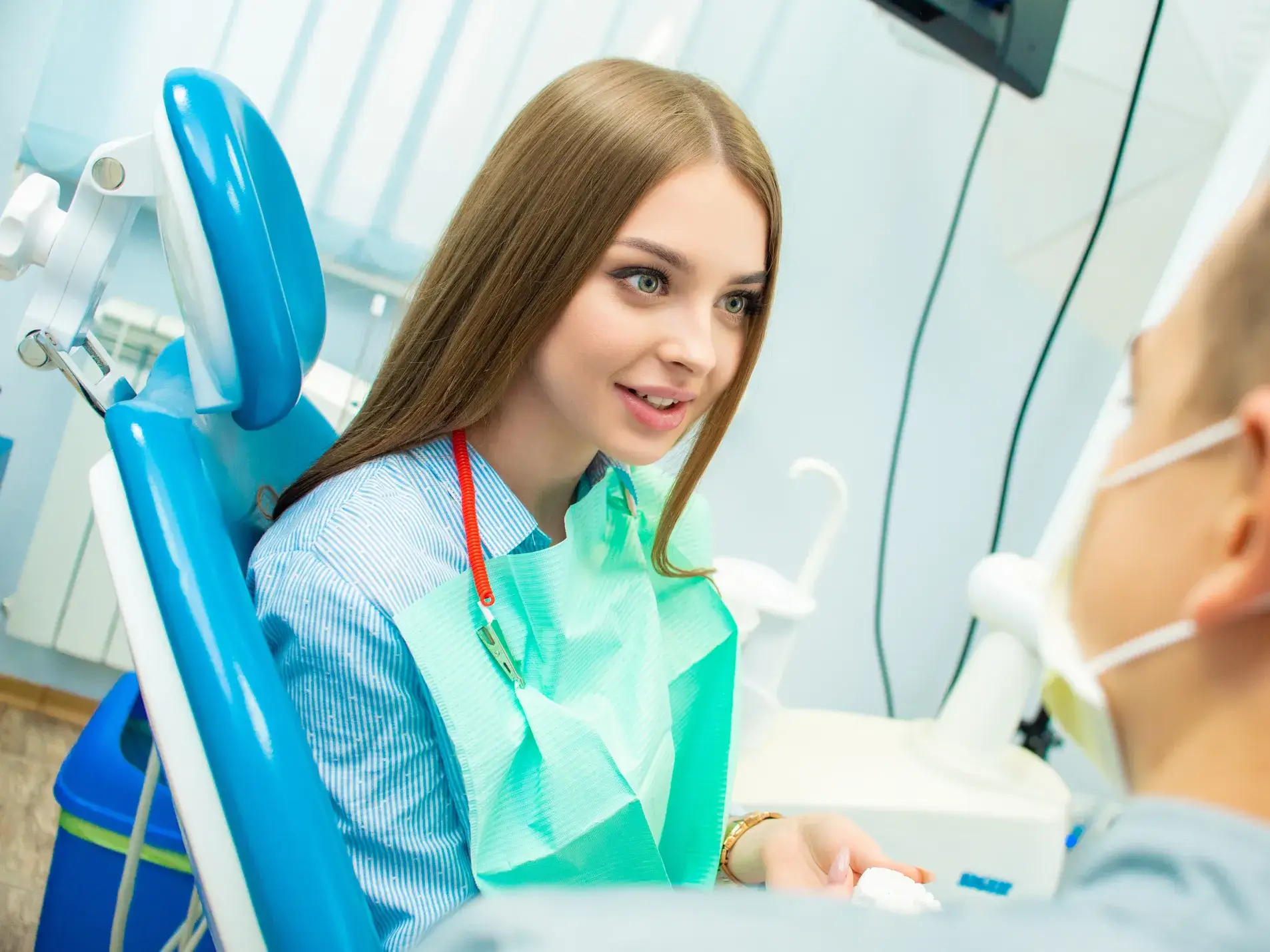Patient talking to dentist