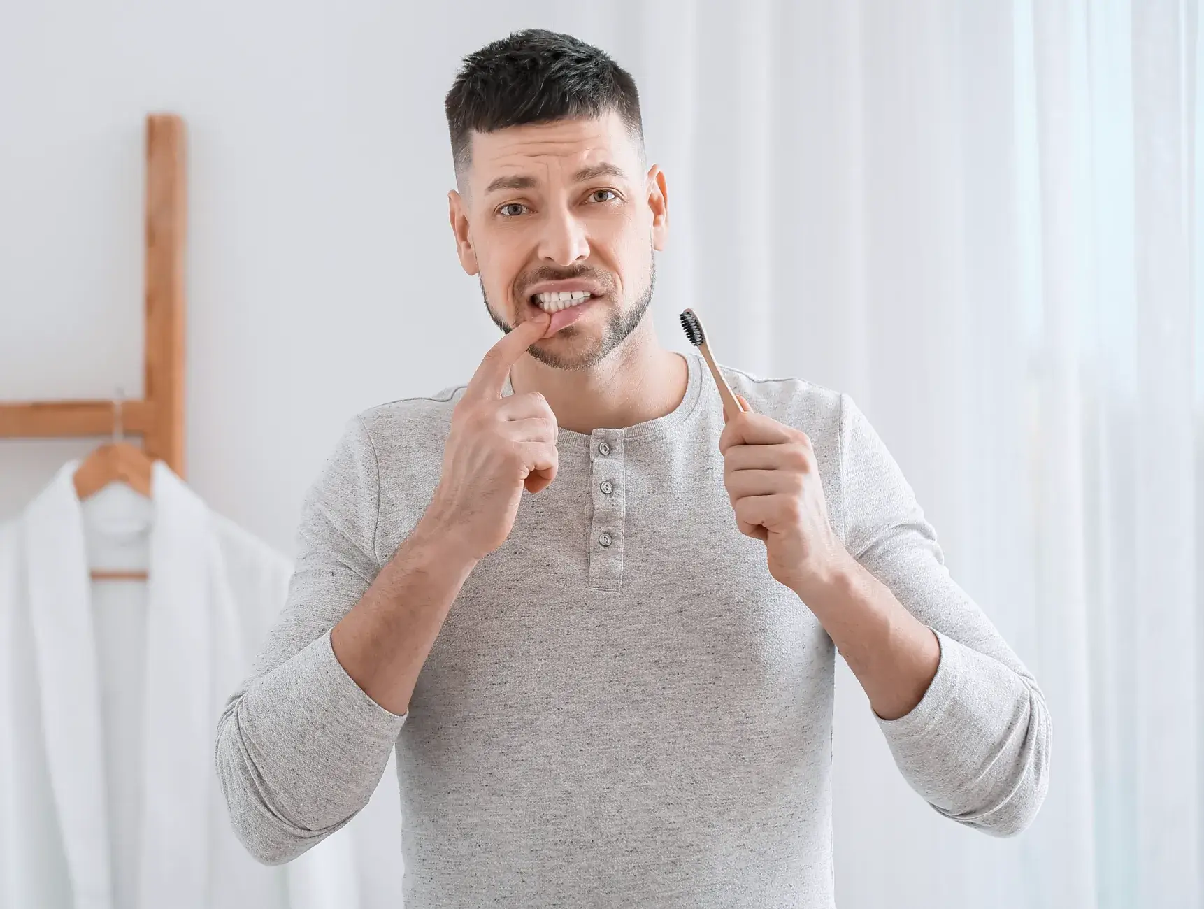 Man hurt by brushing his teeth