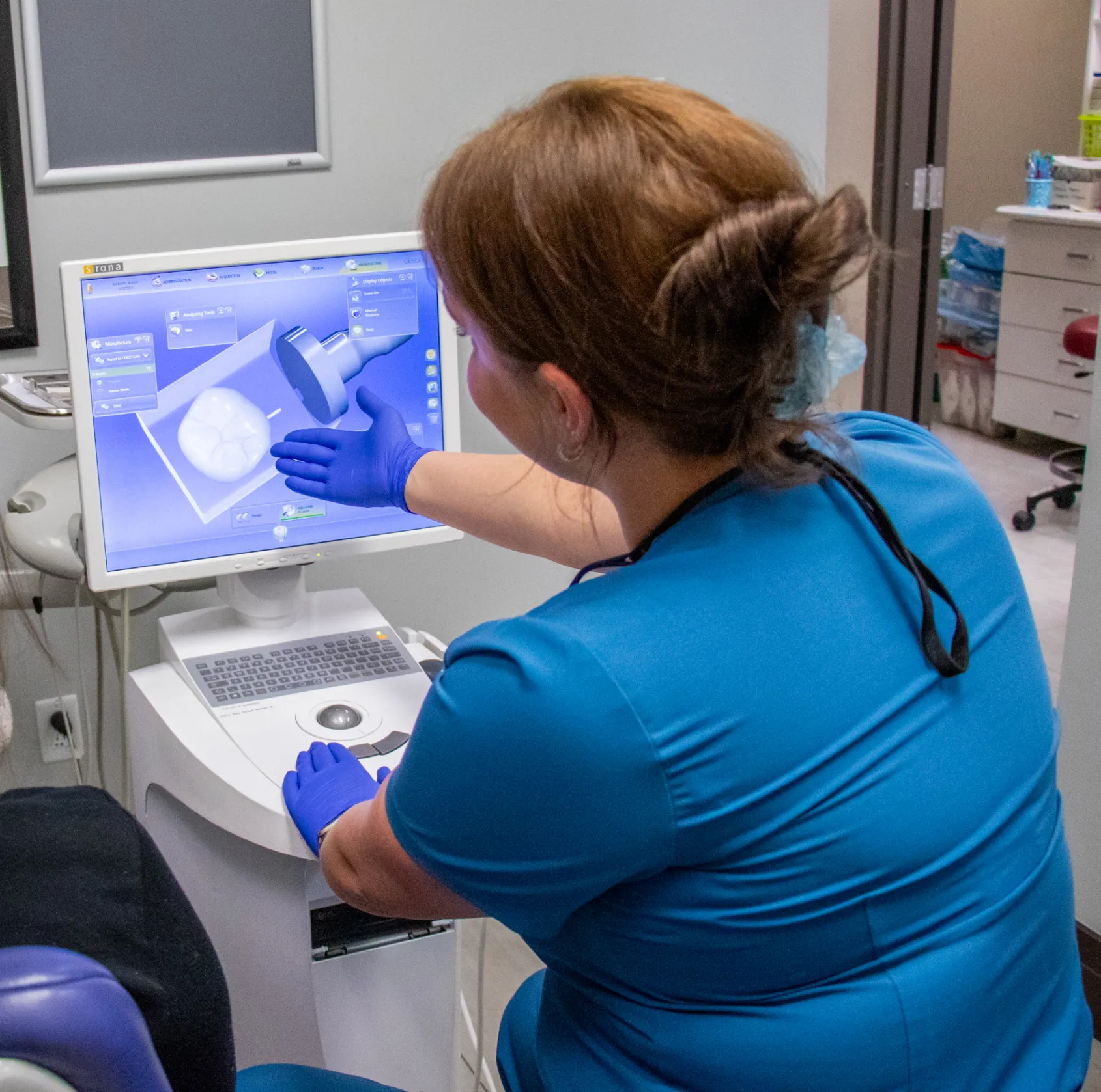 Team member showing 3D imaging