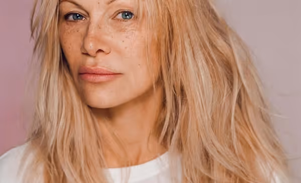 Close-up portrait showing natural skin texture and facial features