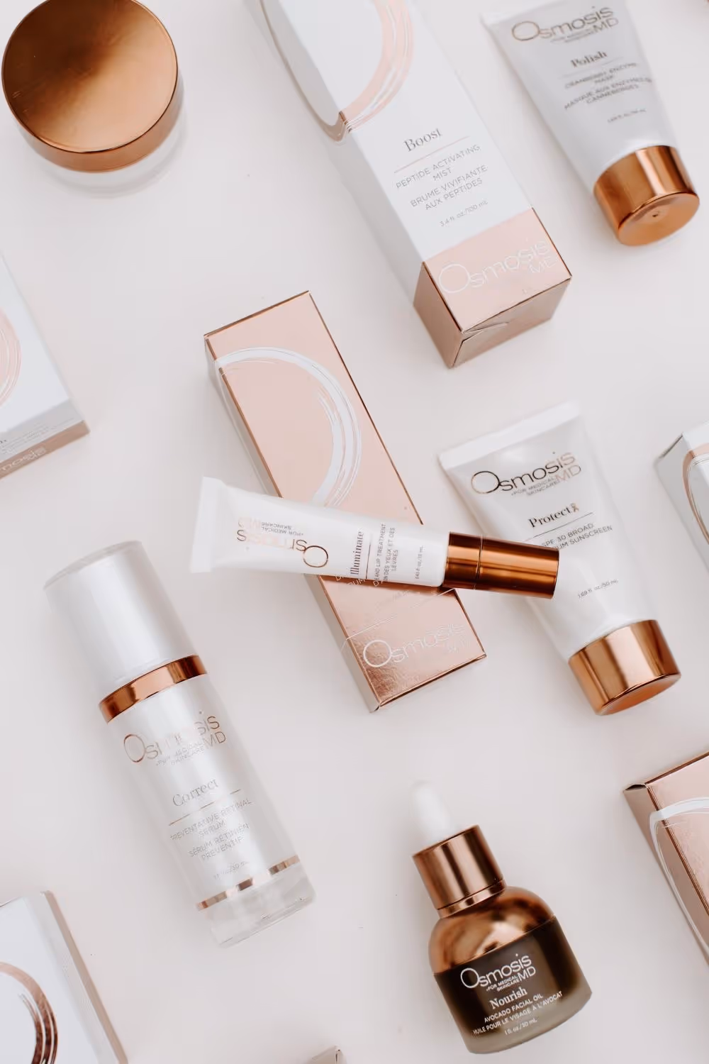 Assorted Osmosis MD skincare products arranged in a flat lay