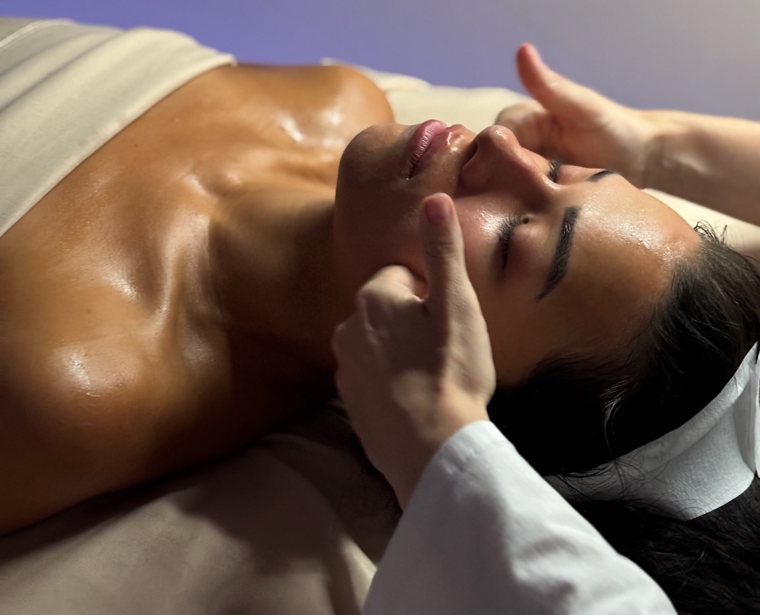 women recieving a buccal massage