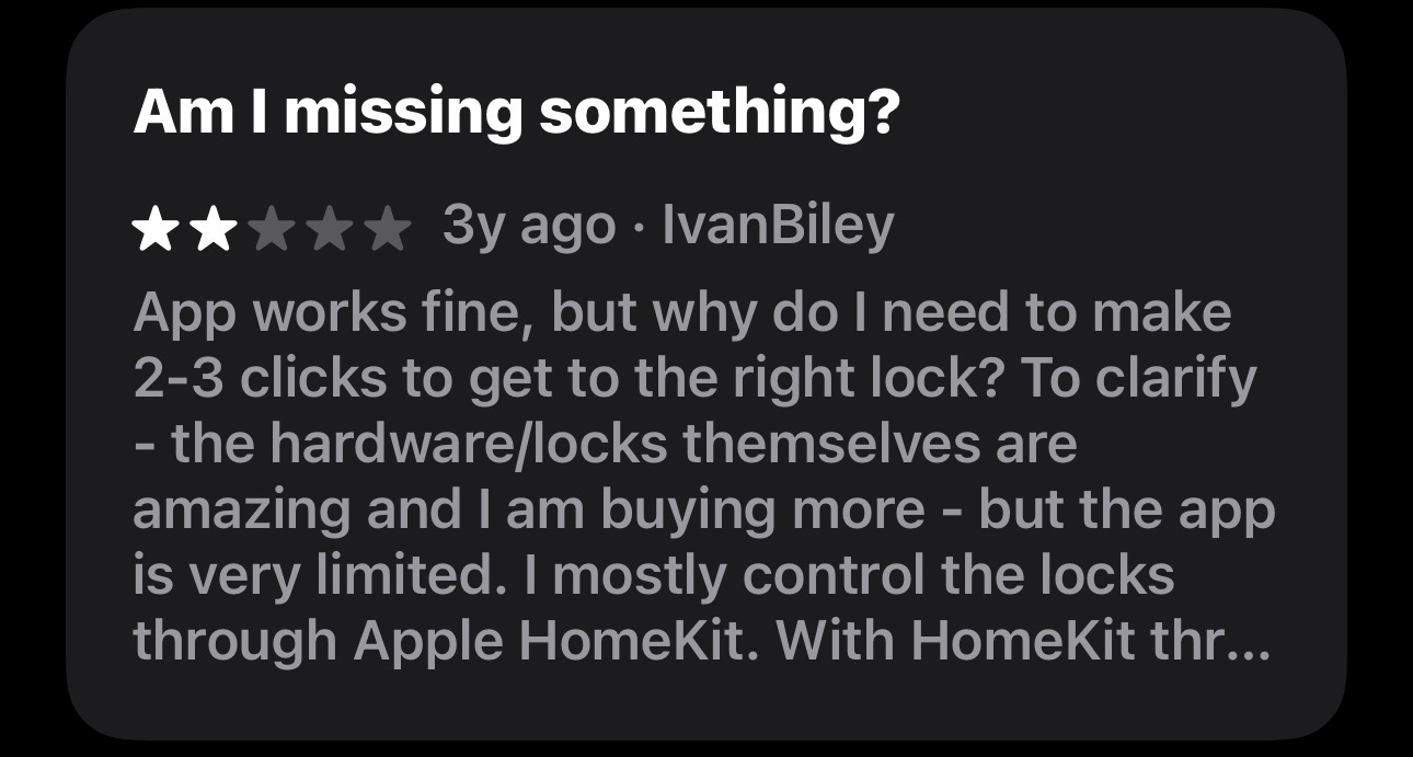 User review with 2-star rating questioning why app requires 2-3 clicks to access correct lock.