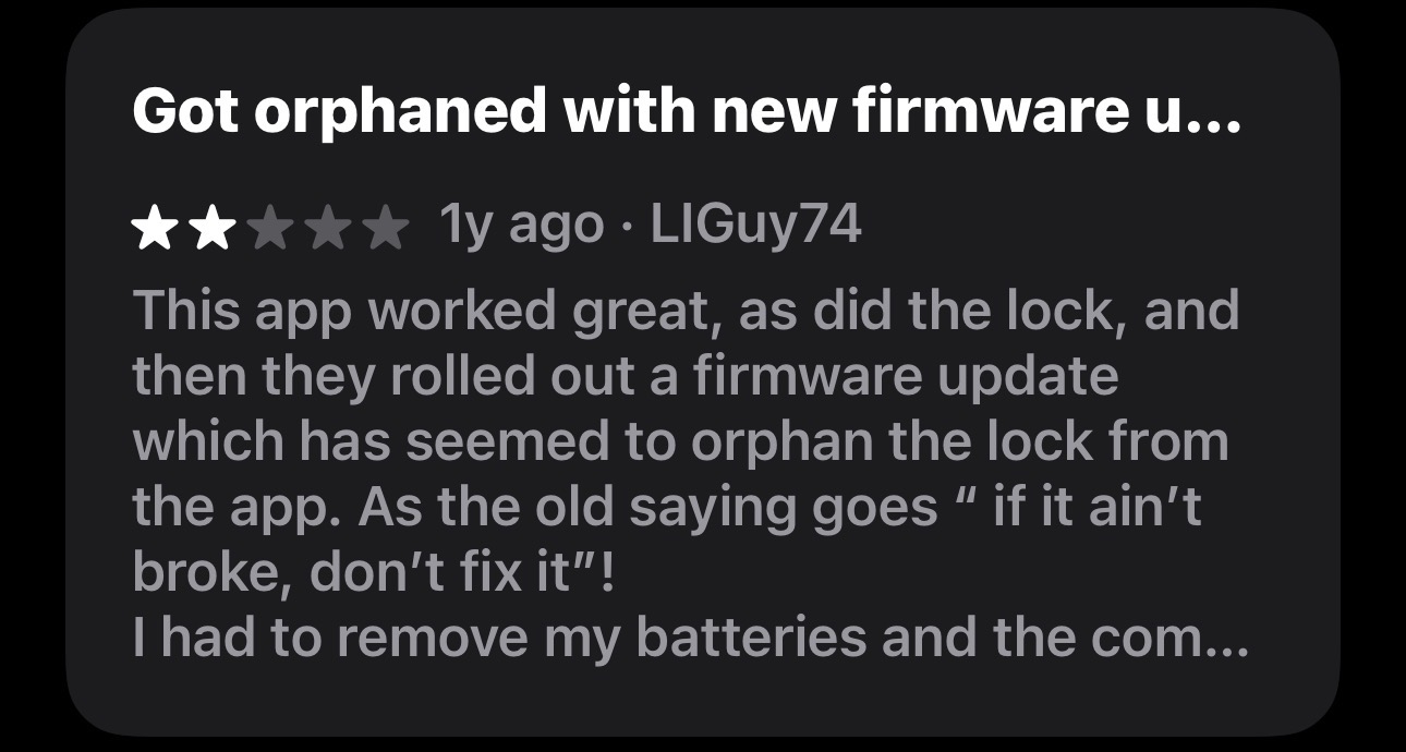 User review giving 2 stars, complaining the app orphaned the lock after a firmware update.
