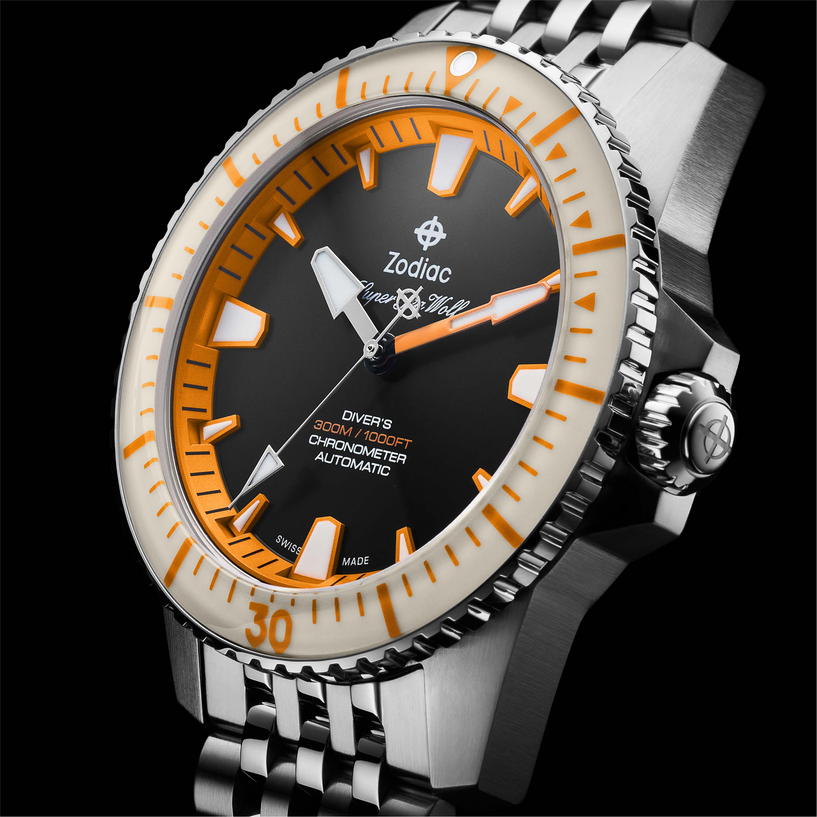 Close-up of Zodiac Super Sea Wolf diver's watch with black dial and orange accents, stainless steel strap.