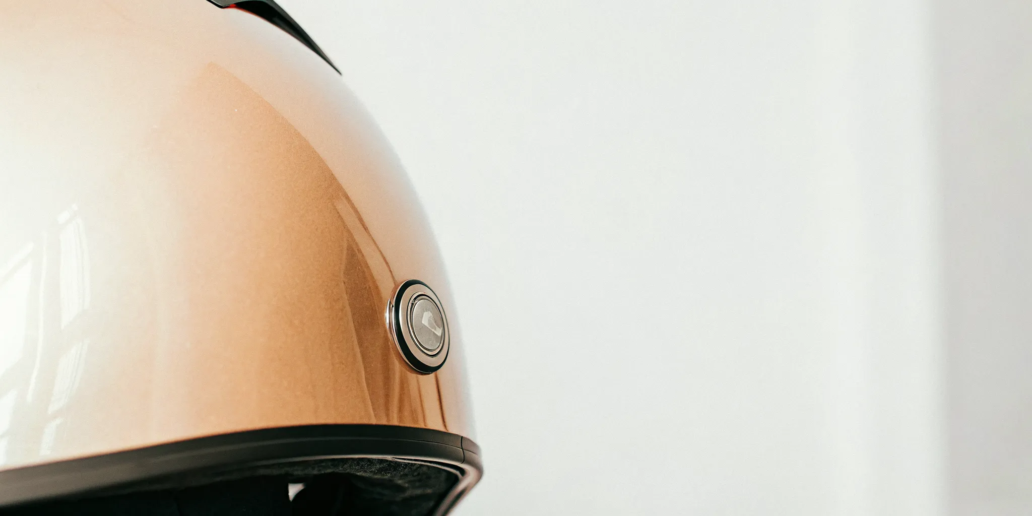 A close-up of a DOT compliant certification label on the back of a motorcycle helmet.