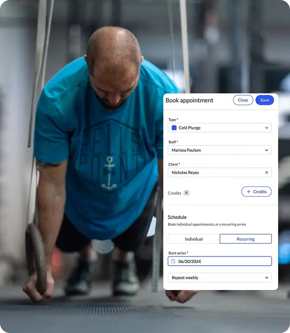 Man in a blue shirt performing a plank exercise on rings with a digital appointment booking form overlay for a cold plunge session.